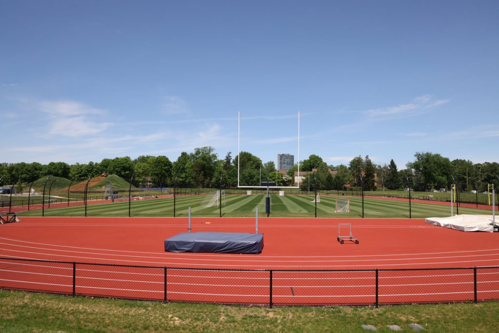 The renovated grass field, now the soccer bowl on the Guy Fraiture Field, with the newly placed and rebuilt Dugan track